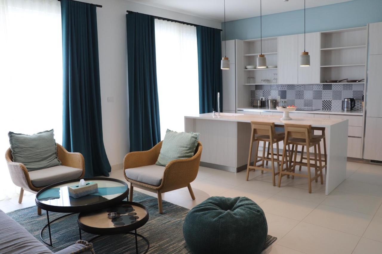 Cloud 7 Residences Ayla Akaba Exterior foto A 3D rendering of a living room